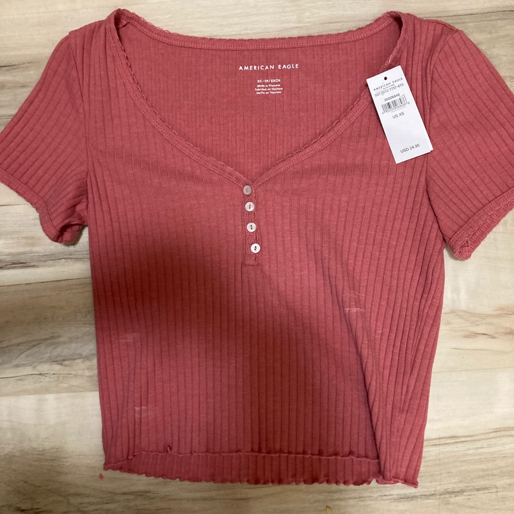 American eagle pink crop top with slight stains that idk  where they came from😁